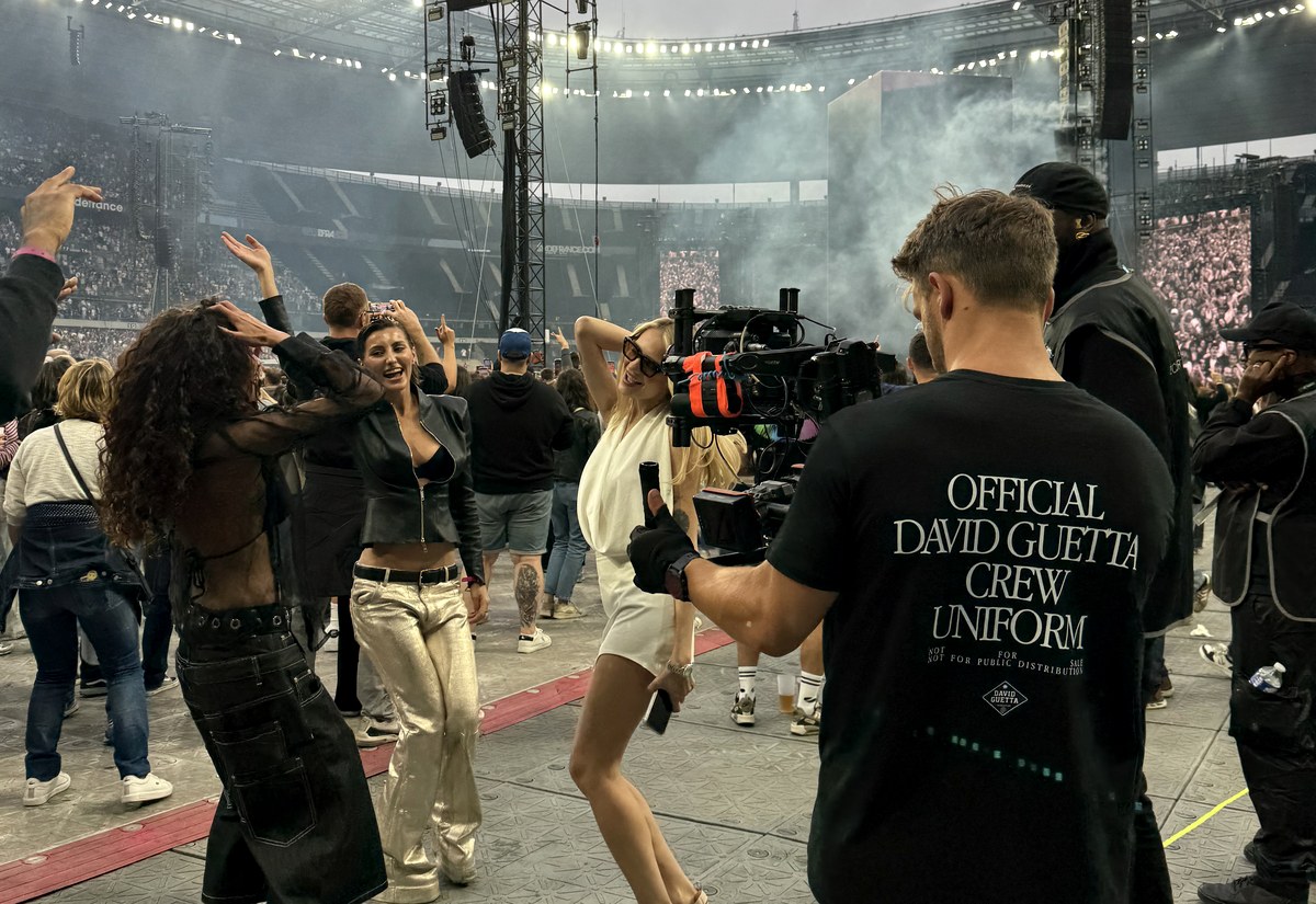 Filming dancers on stage at a stadium show with a RED camera